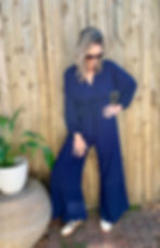 woman in viscose navy jumpsuit