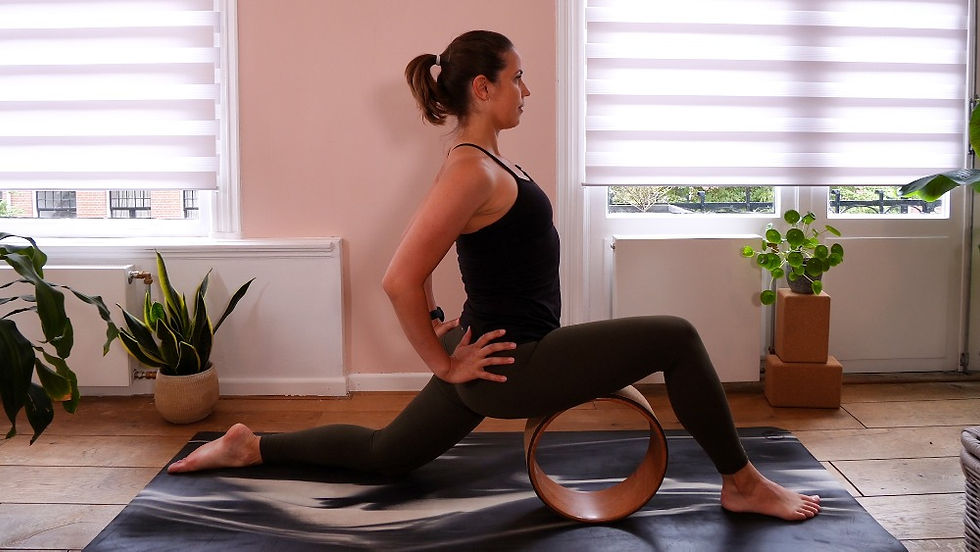 yoga wheel hip flexor stretch