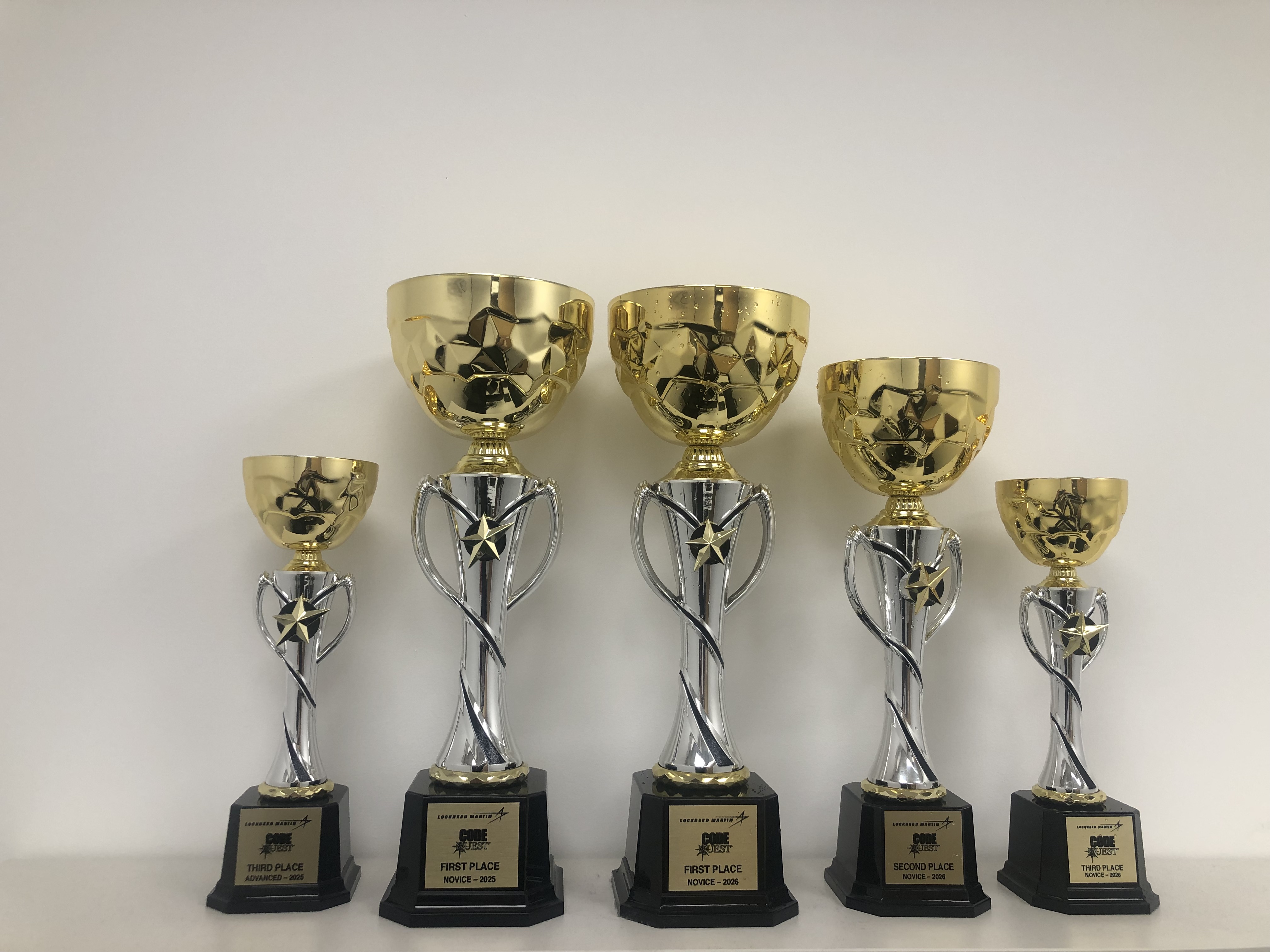 Lockheed Martin Code Quest trophy collection from AlgoPath Coding Academy student achievements
