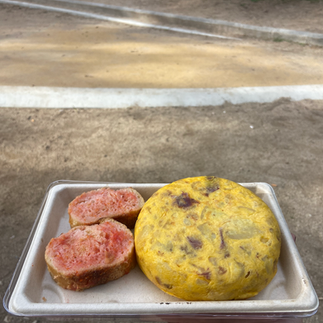 Creamy Spanish tortilla served with Catalan tomato bread