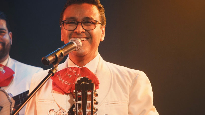 Mariachi Musician in cream colored charro suit