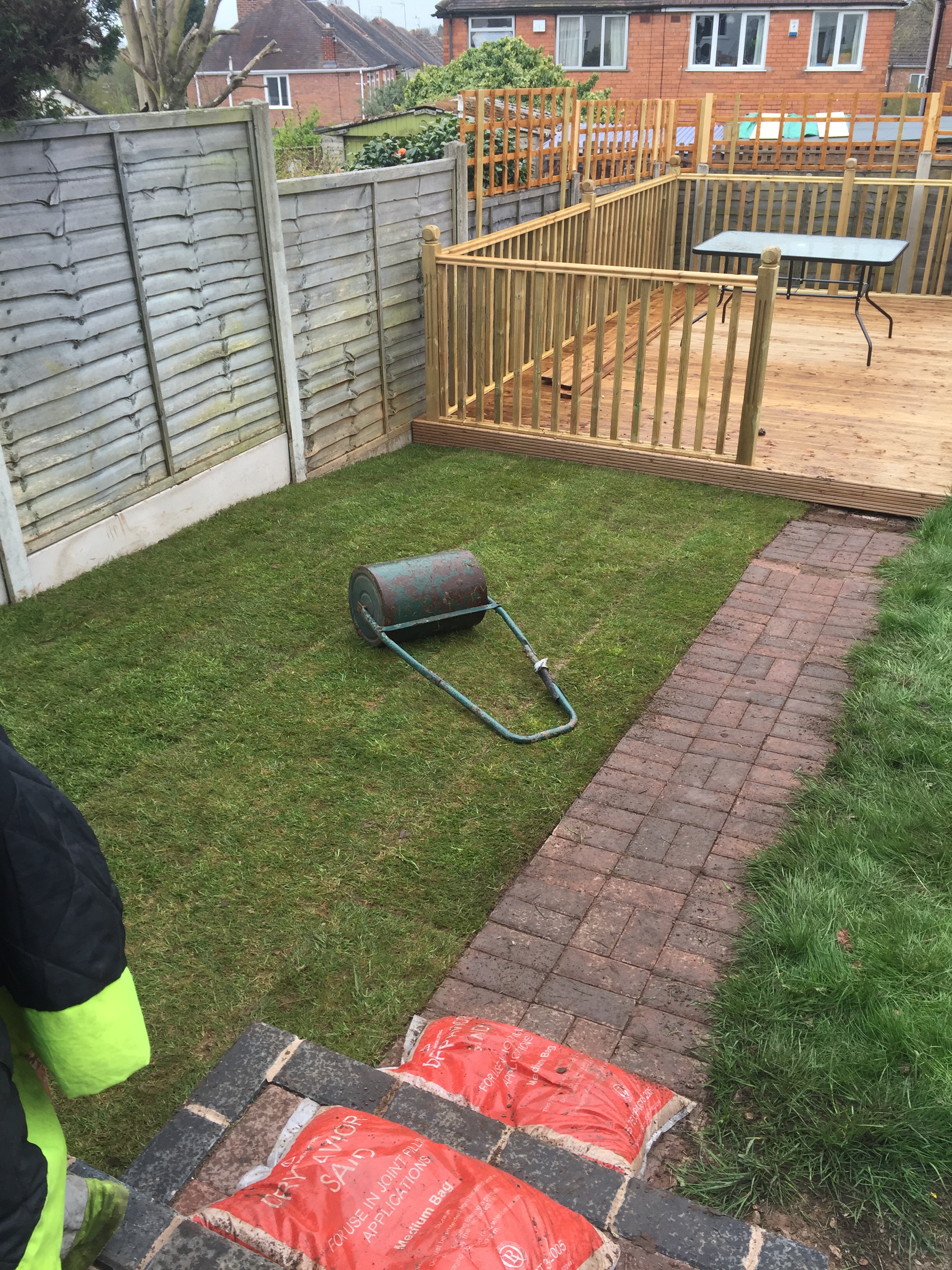 Turf flattened level with roller