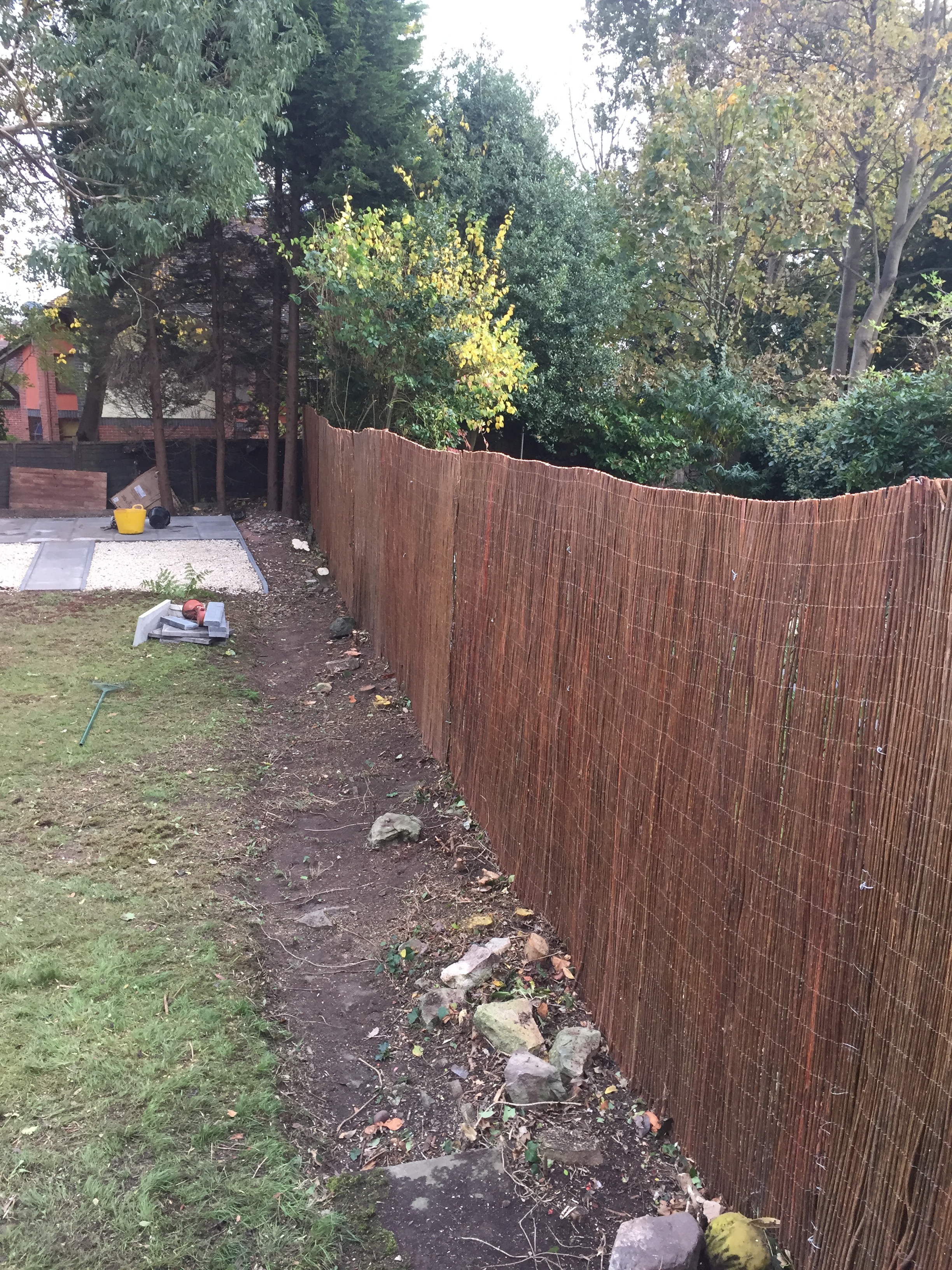 Willow rolls fitted to mesh fence