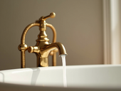 Transforming My Bathroom Oasis with a Gold Floor Stand Swan Bathtub Faucet