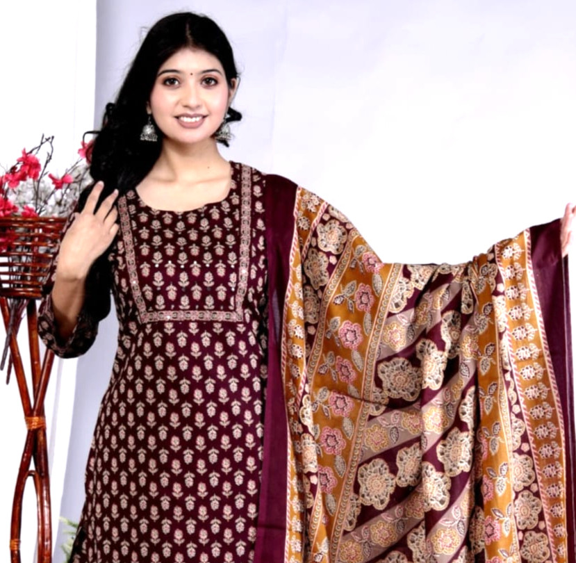 Cotton Exclusive maroon and mustard pure cotton kurta set with floral motifs, striped trousers and printed dupatta.