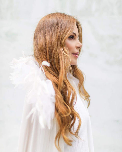 Exuding radioactivity in this look in white