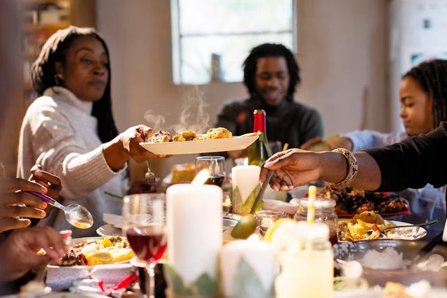 Family enjoying meal at table