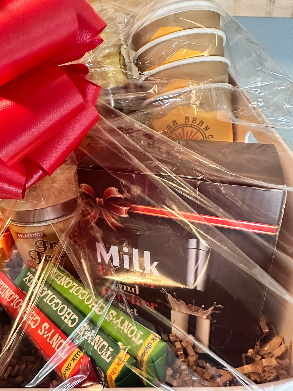 Thumbnail: Bodega being cold luxury gift basket, elegantly, packed with premium coffee, gourmet treats, and artificial accessories.