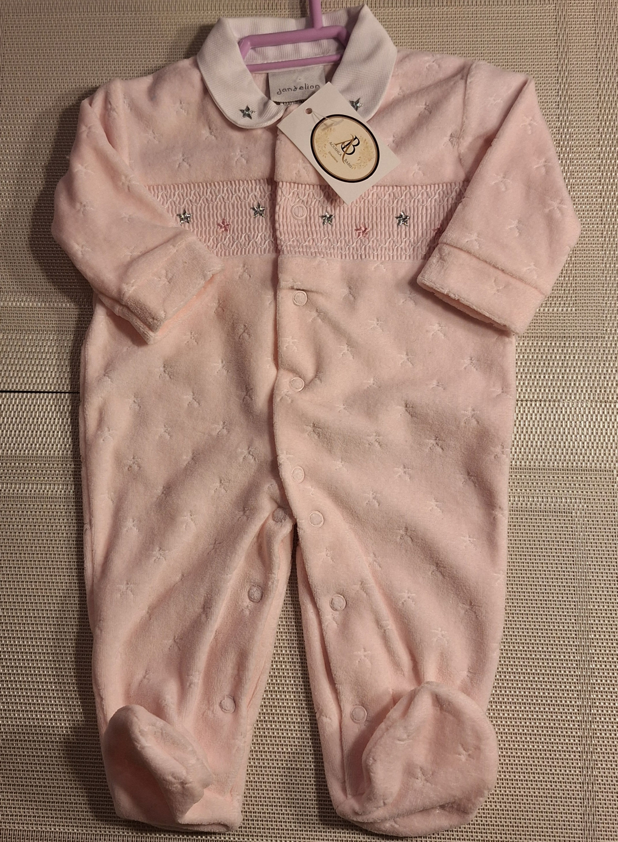   080    Dandelion sleepsuit. 