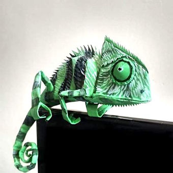 Chameleon is made using paper and color.
