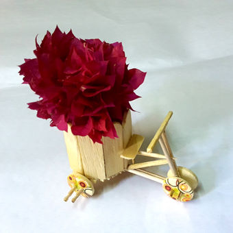 tricycle flower pot, a craft using wooden scrap
