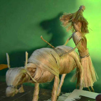 A shepherd with a cow, jute craft