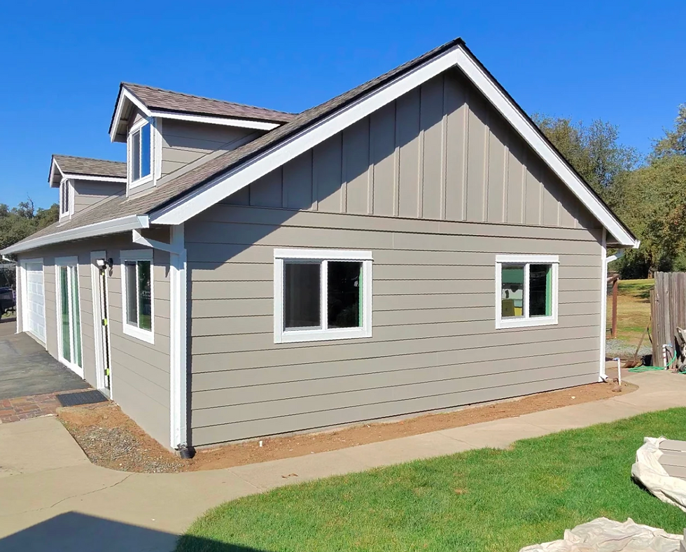 High angle view of a painter preparing paint buckets and tools