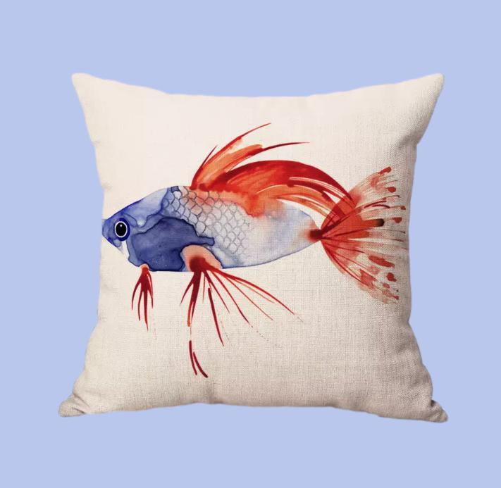 Miniatura: Vibrantly colored tropical fish adorn the front of this pillow cover.