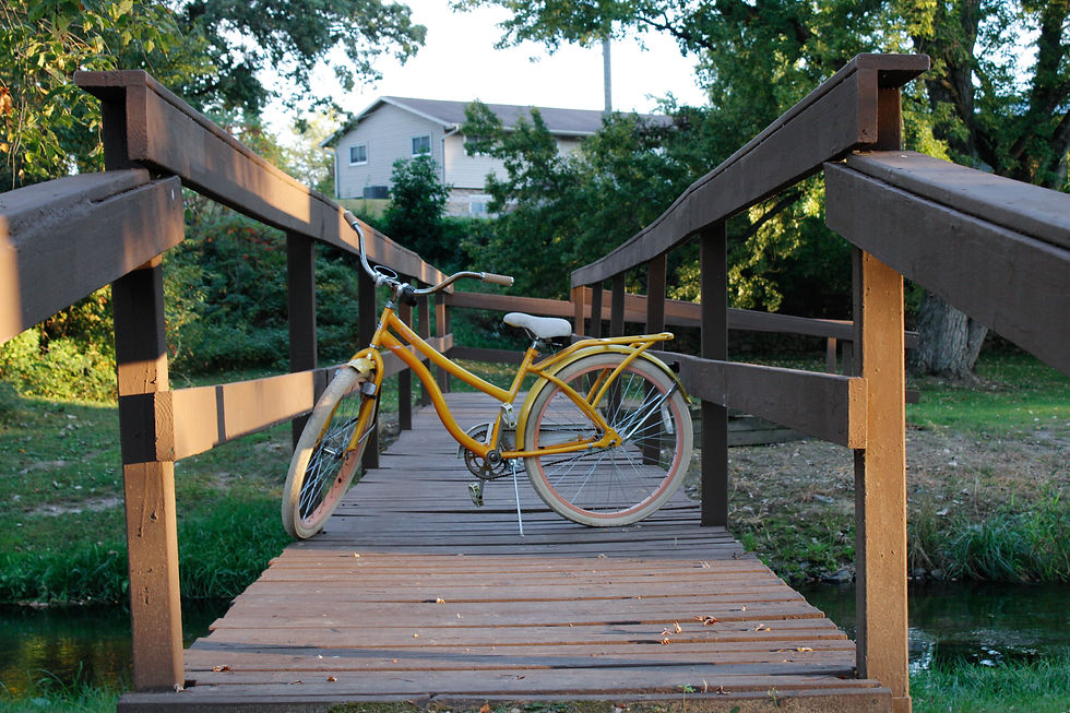 Yellow Bike on Bridge