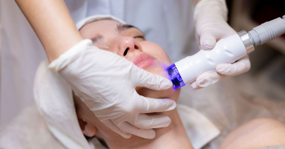 A young beautiful girl lies on the beautician's table and receives procedures
