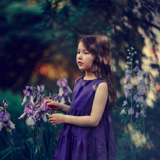 Outdoor photoshoot with purple flowers 