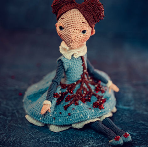 During one of my winter walks, I saw berry-covered branches. That moment inspired this doll.