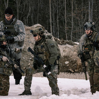 Airsoft players coordinate after helicopter landing