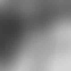 Personnel make their way up a hill in knee deep snow at Blackline Simulations