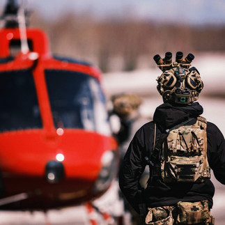 Observing students loading helicopter