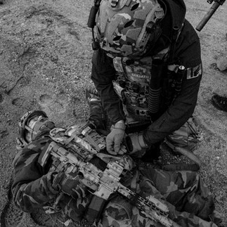 An enemy role player is searched for intelligence at Blackline Simulations