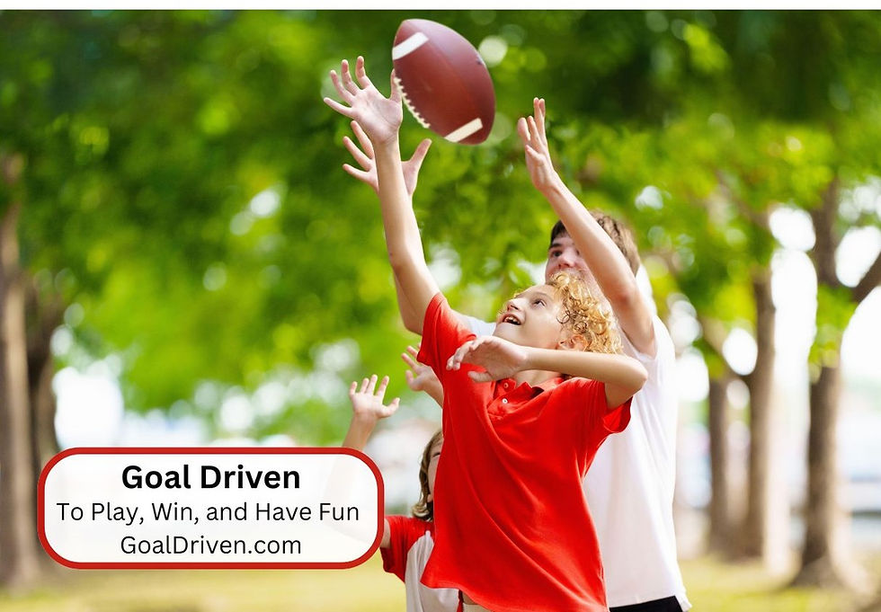 3 boys playing football with a goal to play, win and have fun.