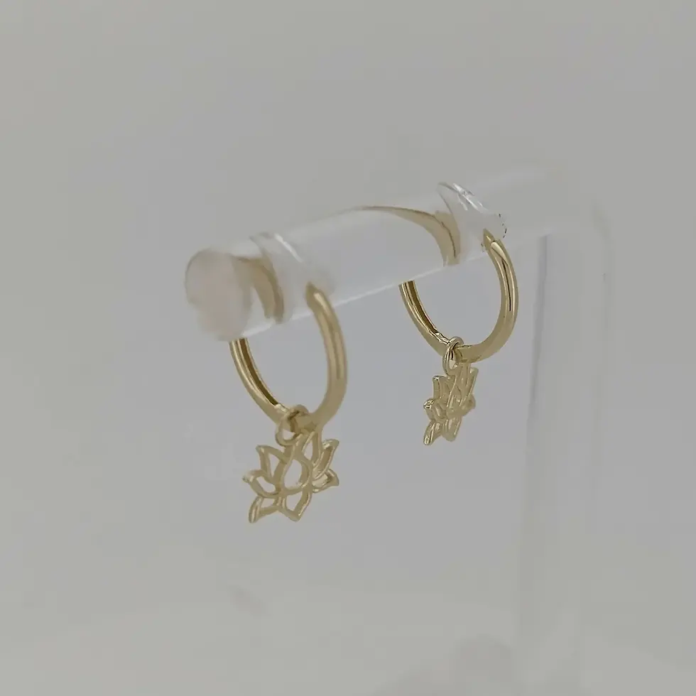 Thumbnail: Reverse angle of 9ct gold lotus charm earrings on display.