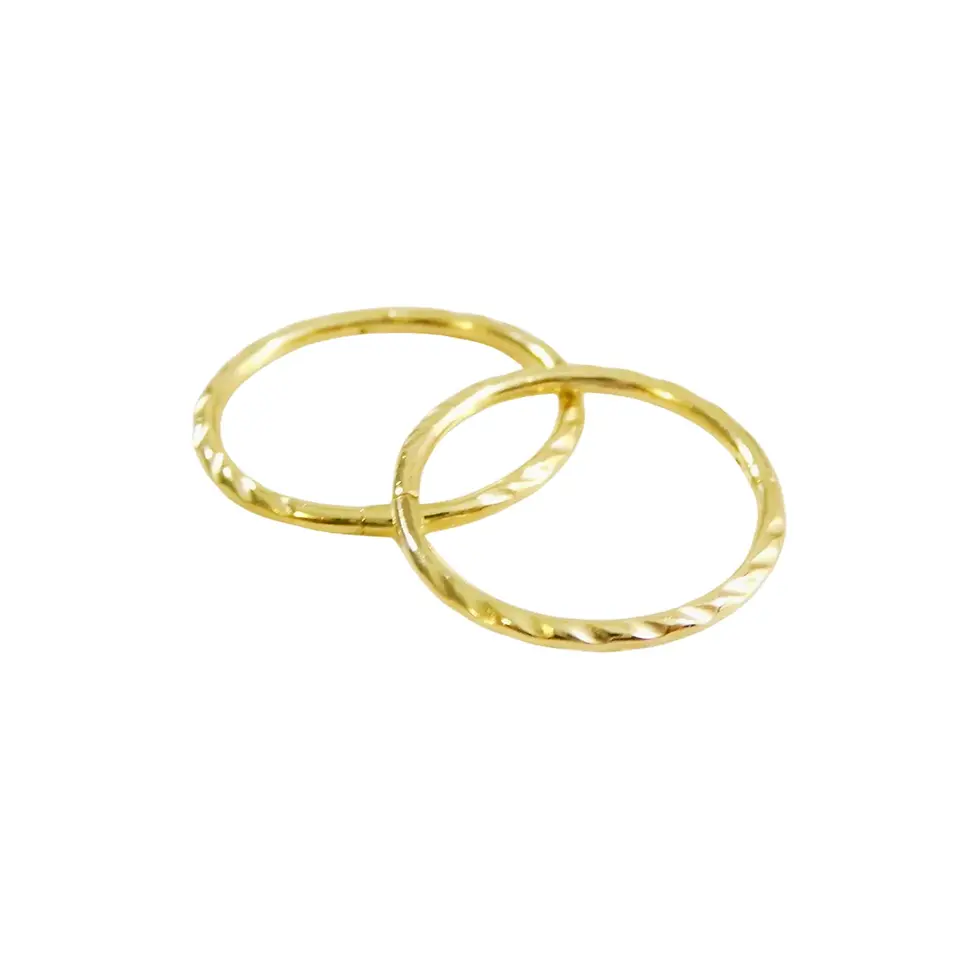 Thumbnail: 12mm 9ct yellow gold twist sleeper earrings side view on white background
