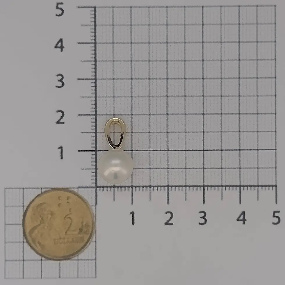 Thumbnail: Size reference of 9ct gold pearl pendant beside ruler and coin.