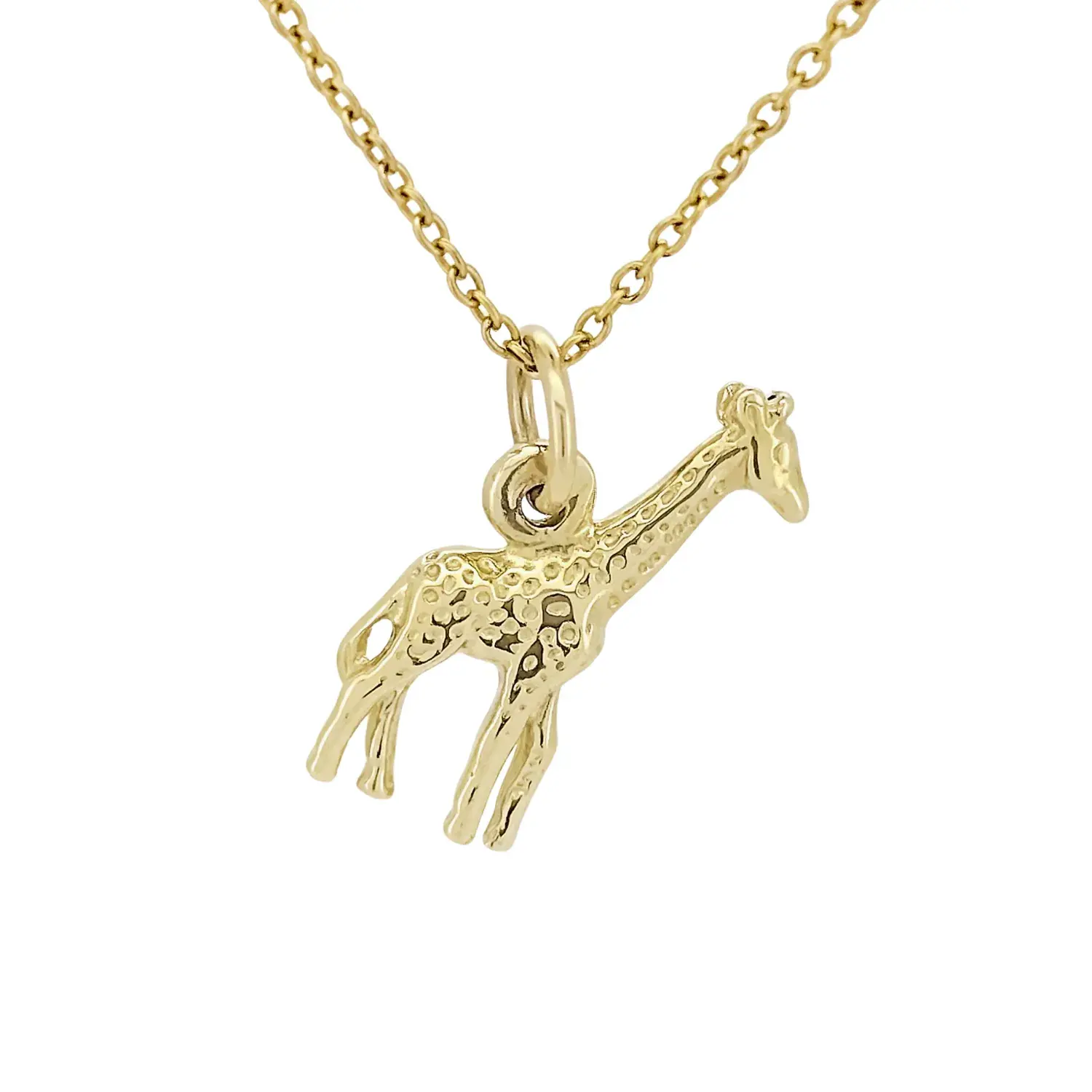 Close-up of 9ct yellow gold giraffe charm with fine detailing