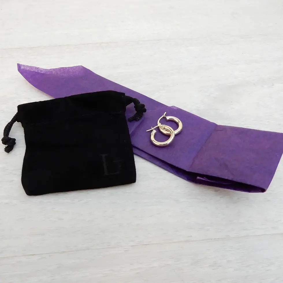 Thumbnail: Two 15mm polished tubular hoop earrings crafted from 9ct yellow gold with the purple bag