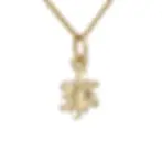 Small 9ct gold sun charm necklace on fine chain, radiant sun motif.