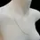 Thumbnail: Fine gold cable chain necklace layered on mannequin bust