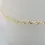 Thumbnail: Side view of 2.5mm Singapore twist anklet in yellow gold on white display
