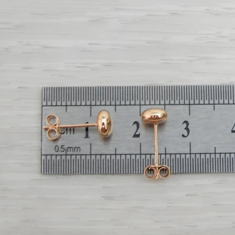Thumbnail: Rose gold 5mm ball stud earrings with ruler measurement for size reference