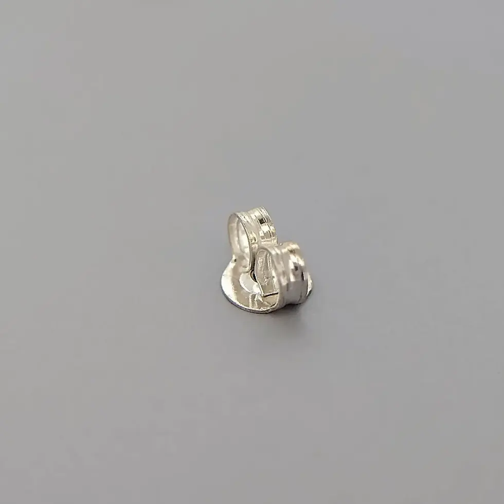 Thumbnail: Minimalist sterling silver starfish pendant charm on display