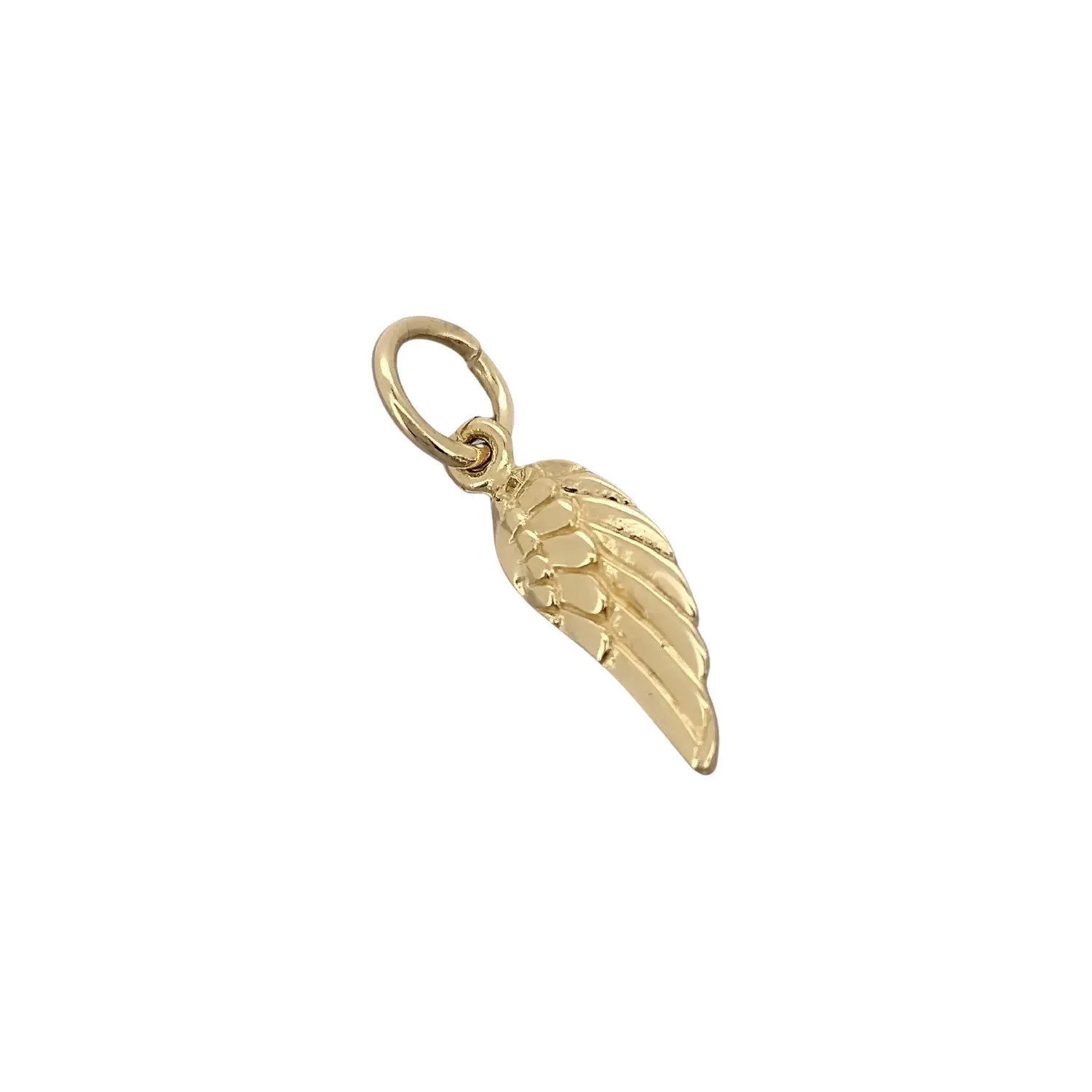 Close-up of detailed 9ct yellow gold wing charm with jump ring