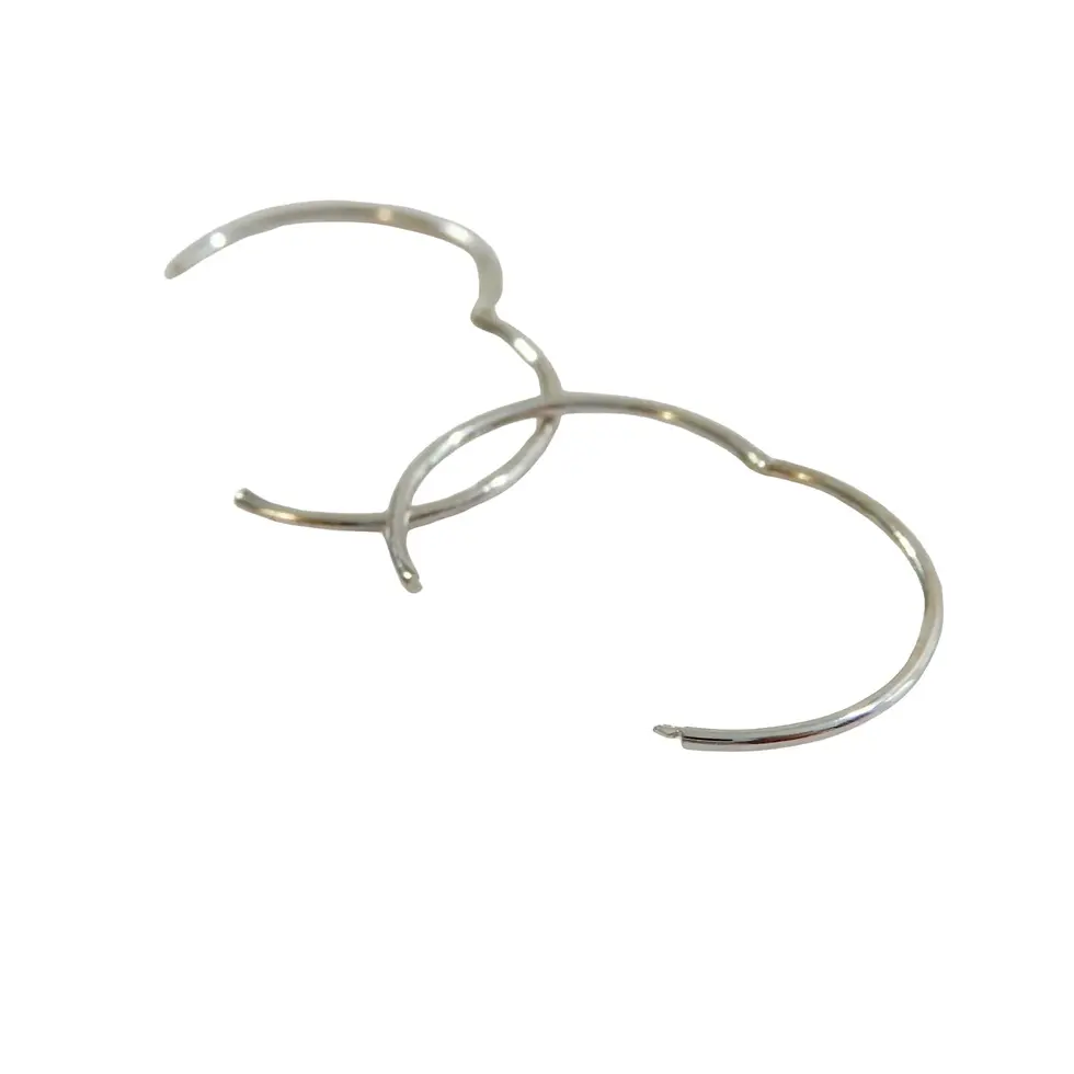 Thumbnail: Open 9ct white gold sleeper earrings displayed on white background
