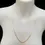 Thumbnail: Diamond-cut 9ct gold anchor chain necklace displayed on bust close-up