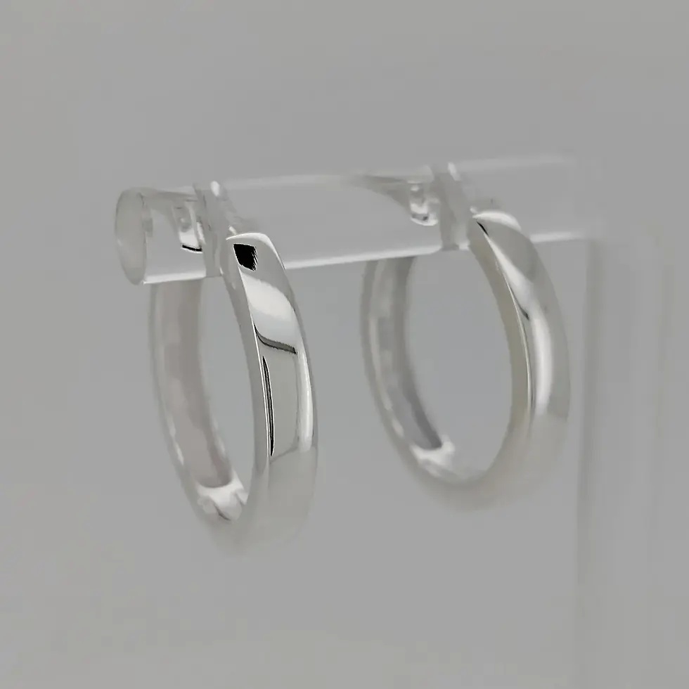Thumbnail: Sterling silver slim round hoop huggies on display.