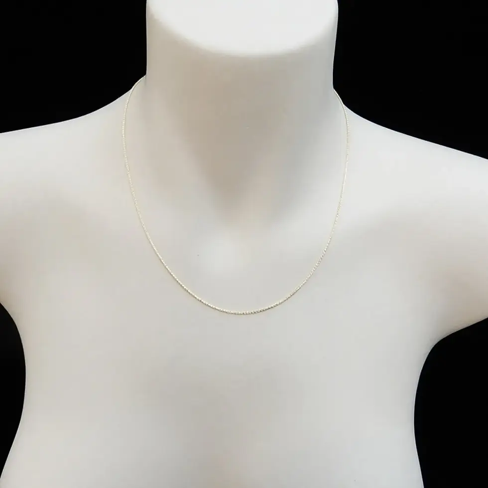 0.9mm Spiga chain necklace in solid 9ct Italian gold displayed on mannequin bust