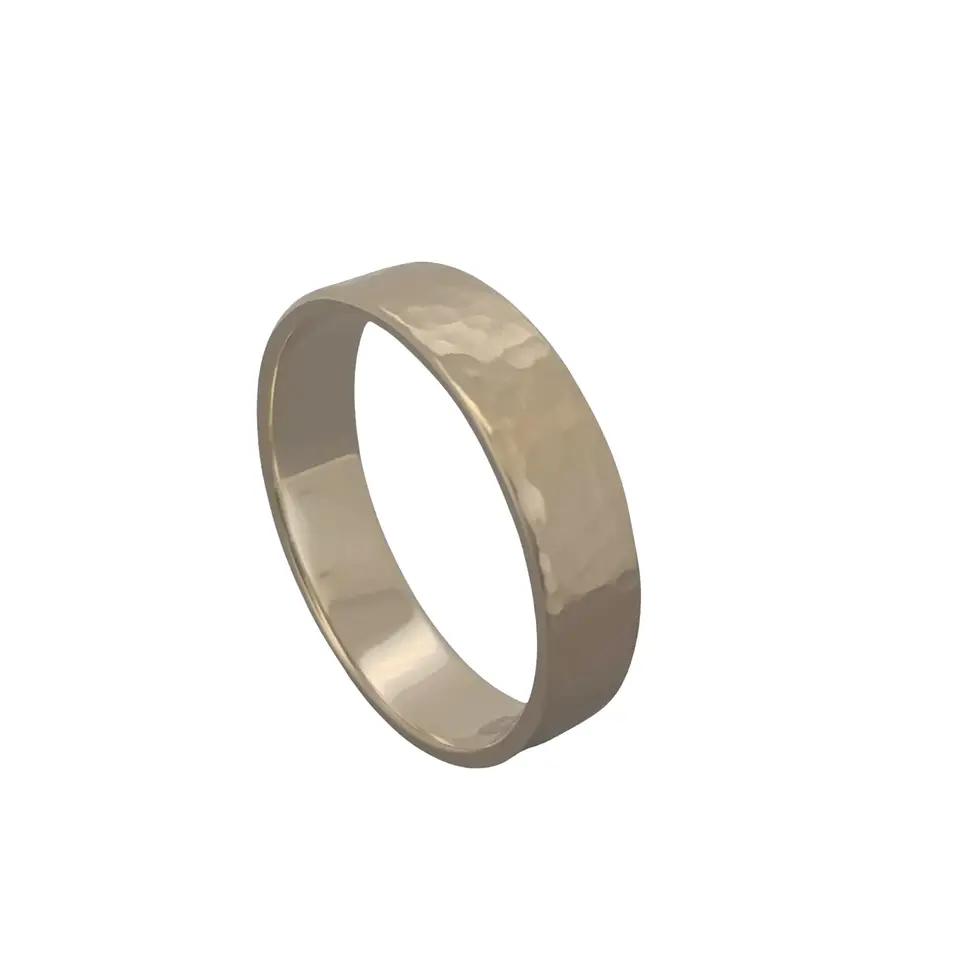 Thumbnail: 9ct gold hammered ring with polished inside surface on side angle view..