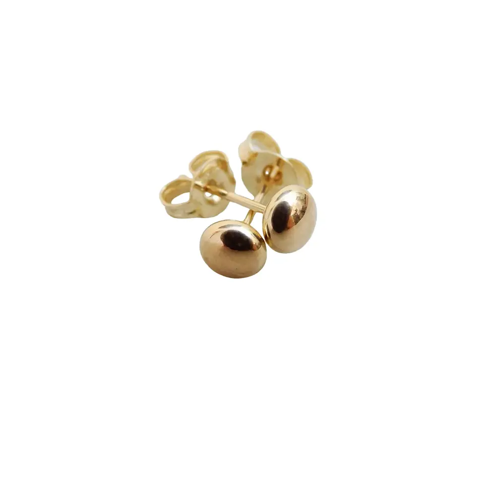 Thumbnail: Polished 4mm flattened ball stud earrings in yellow gold displayed together