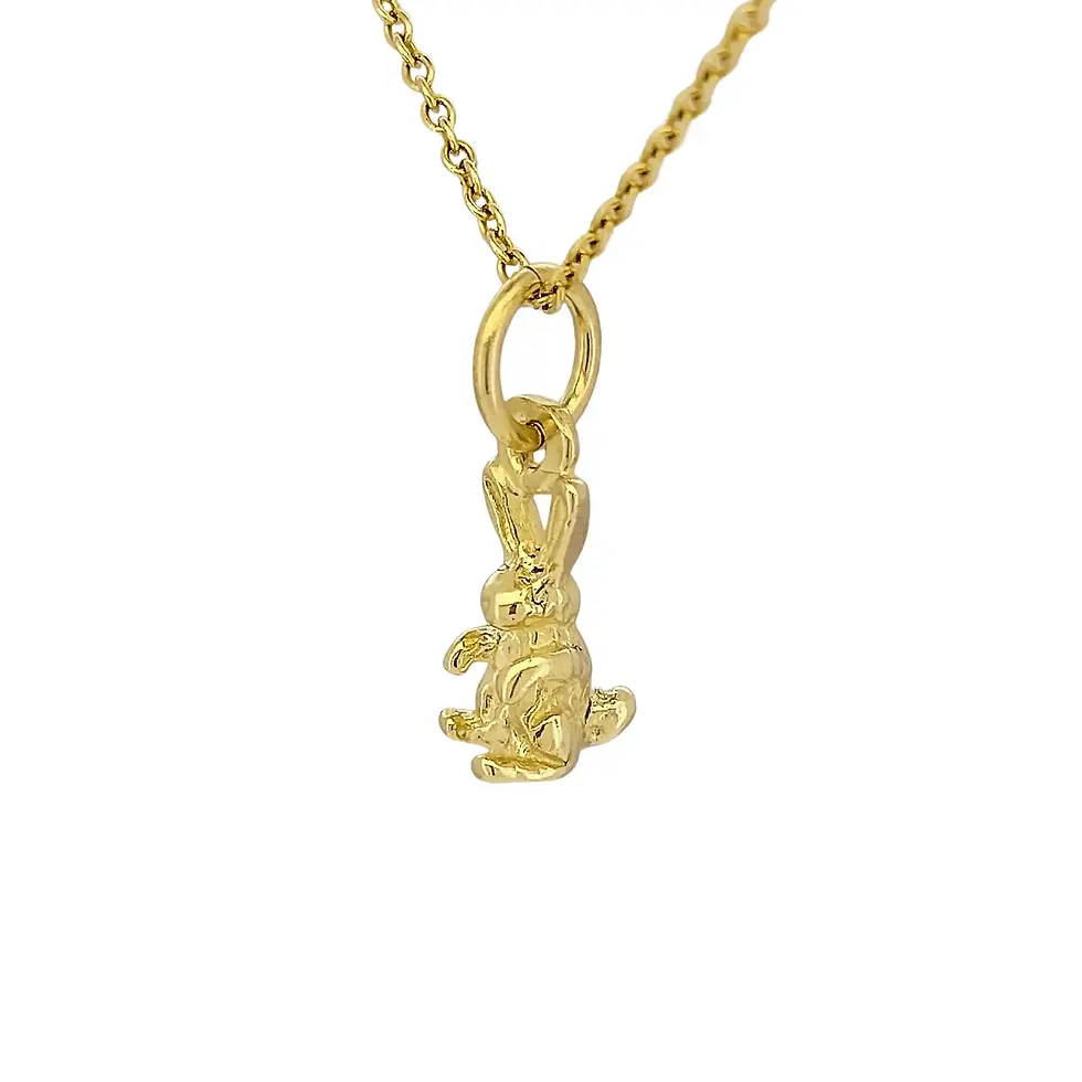 Thumbnail: Angled front of 9ct yellow gold rabbit pendant with long ears and fine detail