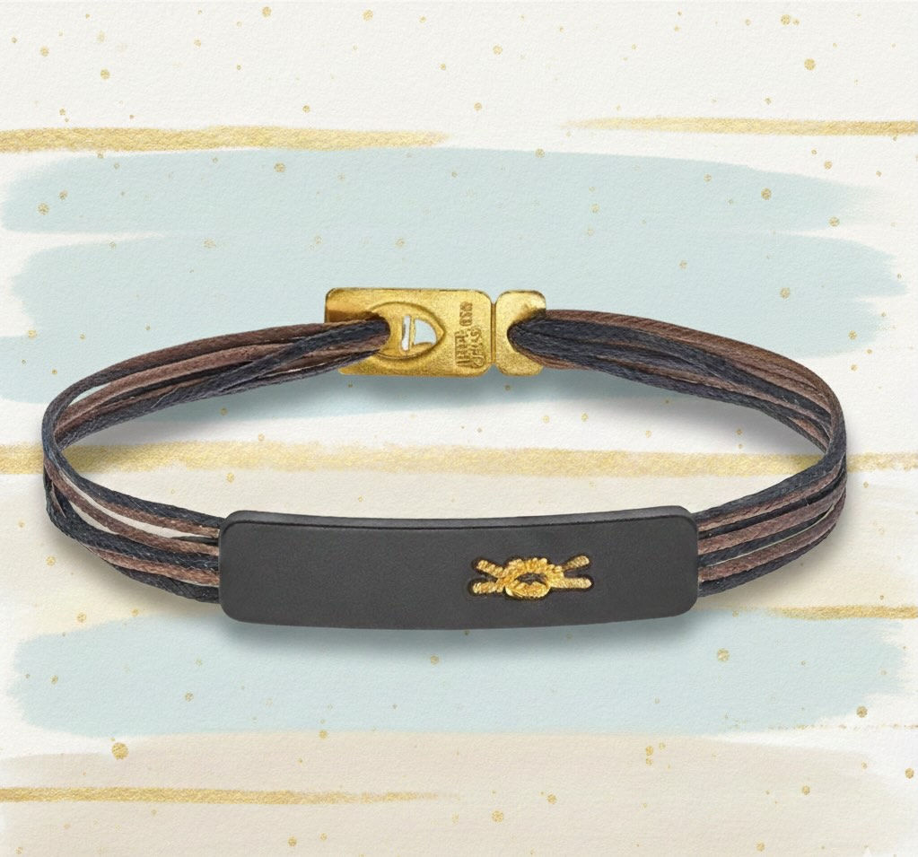 Handmade cord bracelet with clasp and silver element – minimalist unisex jewelry.