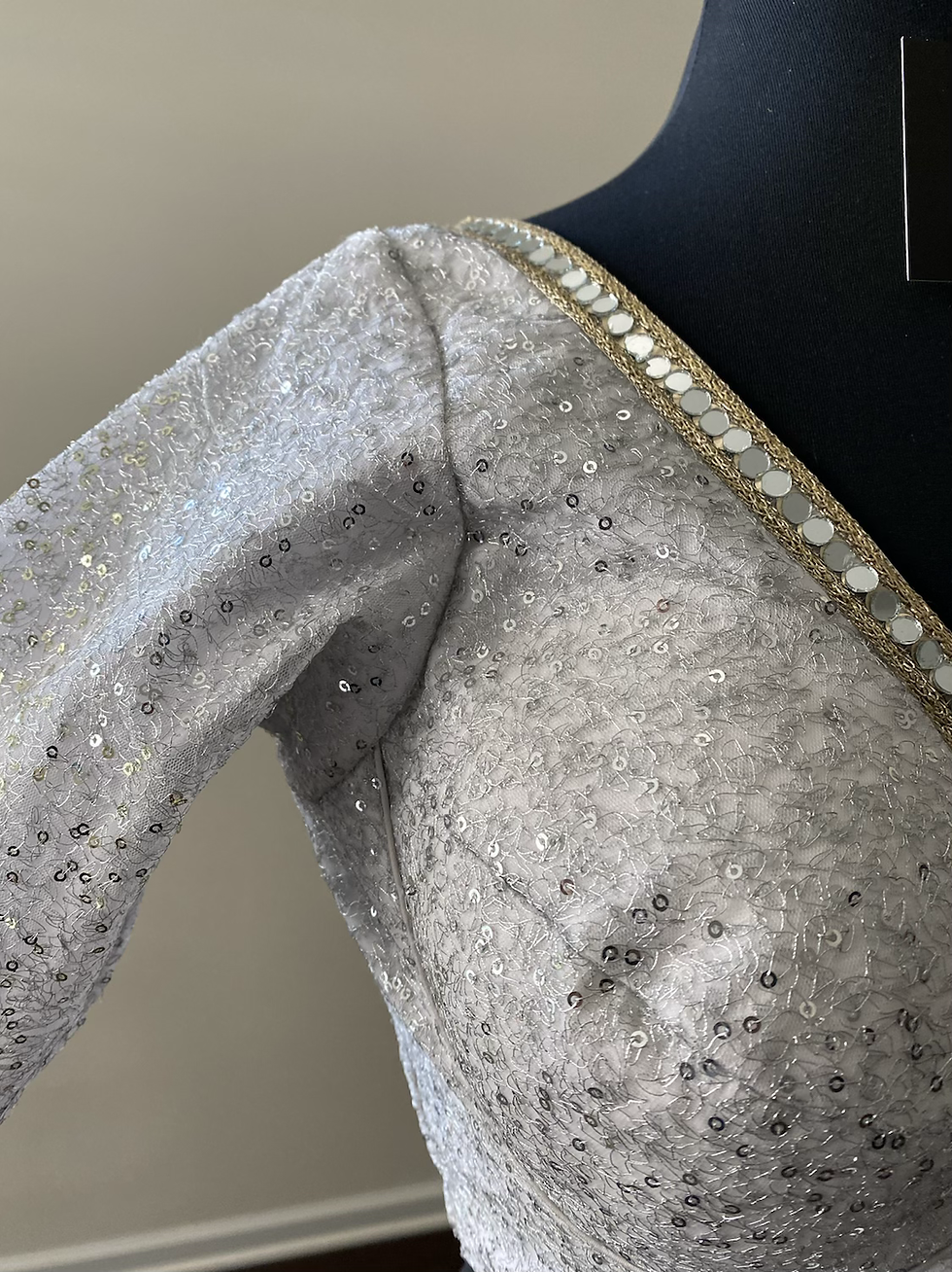 Thumbnail: Silver blouse.