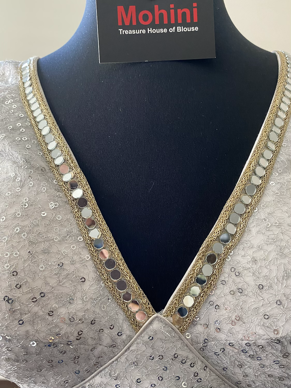 Thumbnail: Silver blouse.