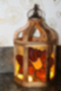 six panel lantern with stained-glass flower for the panels