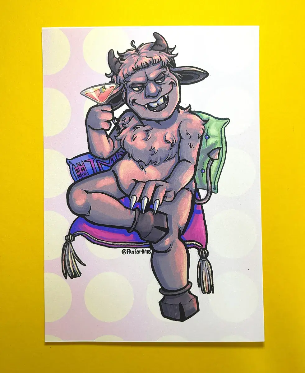 Photograph of the Lincoln Imp print. The print has a matte finish. It depicts the Lincoln Imp with legs folded, lounging against three cushions with what looks like a martini cocktail in hand as his eyes focus sideways, a mischievous, knowing open mouthed smile on his face